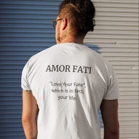 back-view-t-shirt-mockup-featuring-a-man-with-a-head-bun-standing-on-the-street-32814